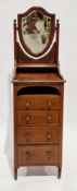 Edwardian mahogany and satinwood inlaid washstand, comprising a shield-shaped bevelled edge swing