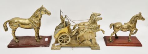 Brass model of a Roman warrior riding a chariot drawn by two horses, 37cm long together with two