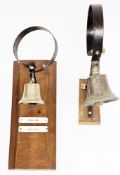 Early 20th century bell, possibly a railway signal bell, mounted on a mahogany plinth with down line