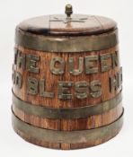 Royal Navy rum grog barrel of tapered form, coopered oak and brass bound with applied lettering '