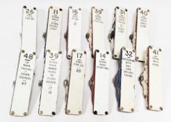 12 mainly British Rail Traffolite signal box lever plates, mounted on cast iron brackets, various