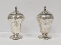 Pair of William IV silver salt and pepper shakers, London 1833, makers marks rubbed, of plain