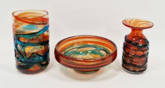 Three pieces of Mdina glass, including: a cylindrical vase decorated with applied blue random