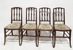 Set of four Edwardian mahogany and satinwood inlaid dining chairs with shaped slat backs and