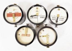 Nine early 20th century railway repeaters, all in circular bakelite cases including signal box