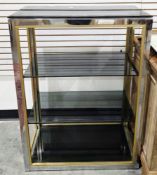 1970's Italian etagere designed by Renato Zevi, comprising smoky glass shelves on a chrome and brass