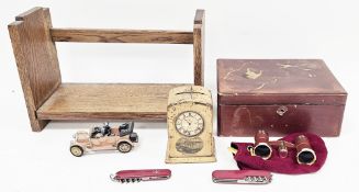 Mauchlineware Newbiggin Beach moneybox in the form of a clock, 11cm high, an Art Deco oak table-