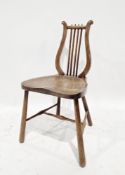 Late 19th/early 20th century Arts & Crafts mahogany lyre back music chair having a saddle seat, on