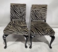 Pair of French-style side chairs upholstered in zebra-skin patterned fabric, on black finished