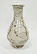 Jim Malone (1946-), a stoneware Korean bottle, decorated in brushed cream slip, with incised
