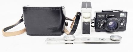 Rollei 35 SE compact camera, a Rollei Strobomatic E 17C flash with instruction booklet, two Rollei