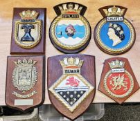 Collection of approx 23 mainly Royal Navy regimental crests, plaster, mostly mounted on wooden