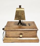 Early 20th century railway signal box block bell with brass cow type bell on a mahogany base, 28cm