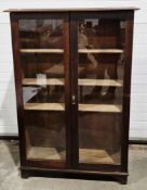 Early 20th century oak glazed library bookcase having two glazed doors opening to four adjustable