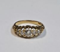 18ct yellow gold and diamond ring of boat-form, claw set with five graduating old cut round