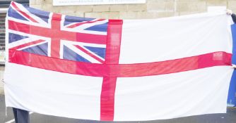 Collection of six linen flags including a white ensign flag 370cm long, an admiralty St Georges