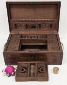 Anglo-Indian or Burmese teak travelling work box, the hinged lid opening to an interior fitted