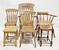 A collection of four chairs and two stools including a Windsor lath-back elbow chair, 111cm high x