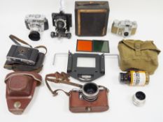 Collection of cameras, field glasses and accessories including a cased Elixa Reflex-A, Audax 120,