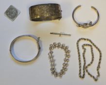 Collection of silver jewellery including two silver hallmarked hinged bangles, one with raised