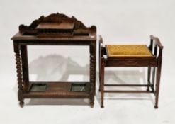 Victorian oak hall stand, the arched foliate scroll carved back with central glove compartment,