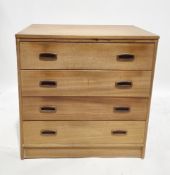 Mid-century teak Schreiber chest of five long drawers, with moulded recessed handles, on a plinth