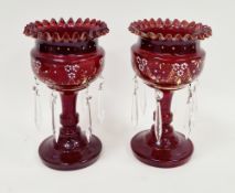 Pair of Edwardian ruby red, enamelled and gilt glass lustres, enamelled and gilt with flowers