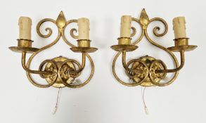 Pair of mid-century Italian gilt metal two branch wall lights by Ciani, each of scrolling design,