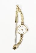 Vintage lady's 9ct gold cased Tavannes wristwatch, the enamel dial with Arabic hour markers,