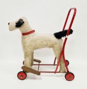 Mid 20th century Tri-ang ' International model aircraft company ' push-along toy, the red tubular