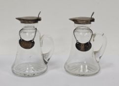 Pair of George V silver-mounted glass whisky noggins, Birmingham 1917, makers marks rubbed, the