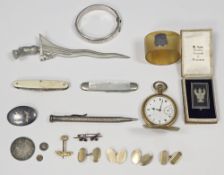 Mixed lot of jewellery and collectable items including a silver part engraved hinged bangle, two