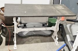 White painted cast metal framed 19th century style garden table, with scrolling supports with mask