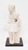 20th century white plaster sculpture of a seated girl reading a book with a young boy standing by