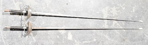 Pair fencing epees, each with chequered grip and domed guard, 110cm long overall (2) (please note