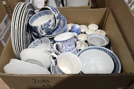 Seven boxes of assorted ceramics including Wedgwood willow pattern blue and white part breakfast