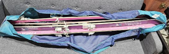 Two pairs of Head Supreme VCT ceramic ice skis and two pairs of poles contained within a bag (please