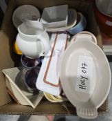 Group of Le Creuset and other similar kitchenwares including an oval two-handled casserole dish