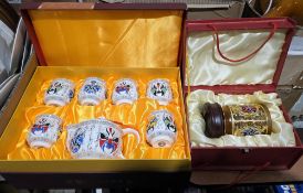 Various boxed sets of modern Chinese ceramics including a mask pattern service, a gilt metal mounted