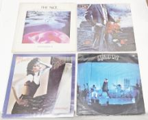 An interesting collection of vinyl LP's including Genesis, Wind and Wuthering (CDS 4005 a-1U-1-2,