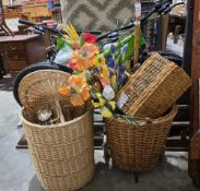 Collection of wicker log baskets, a rectangular basket, a bamboo table top tray, various woven
