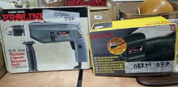 Two boxes of tools including a Black and Decker hammer drill, boxed, Bosch PBS60 belt sander,