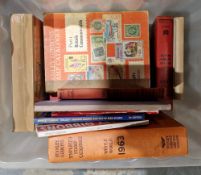 Collection of stamp reference books and empty stam