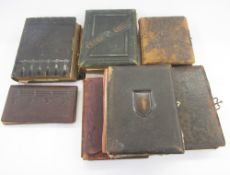 Seven Victorian and later photograph albums mainly leather bound, containing black and white and