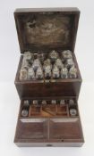 19th century mahogany cased apothecary cabinet fitted with 16 glass stoppered bottles of various