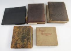 Three Victorian and later photograph albums, leather bound, containing portrait photographs, some