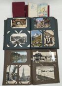 Two postcard albums containing various cards of mostly topographical interest, early 20th century