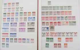 Stamps of British POs Overseas: Two maroon stock books; one of mint and one of mint & used QV-QEII