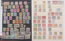 Br Empire & Nepal stamps: QV-QEII stock book of Malaya, Sarawak, N.Borneo and Labuan, with Nepal
