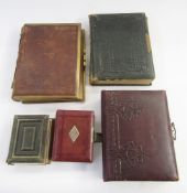 Three larger Victorian and later photograph albums, one with brass bound edges and lock, and two